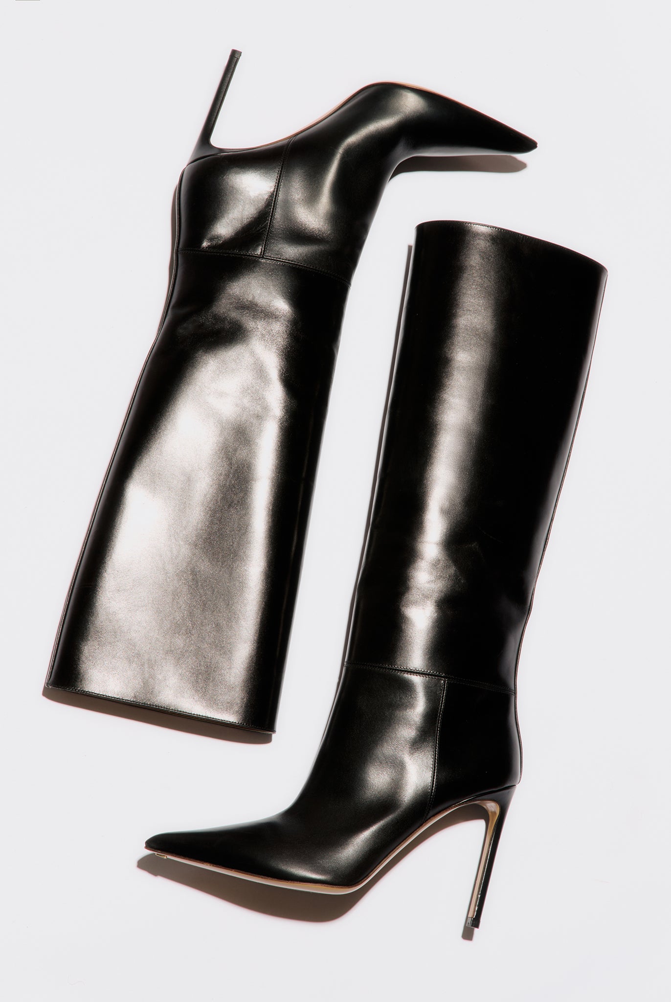 high heeled boot in black leather