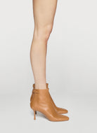 mou soft bootie with a zip and button closure on the back heel hight 95mm