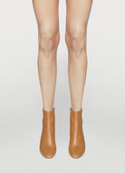 mou soft bootie with a zip and button closure on the back heel hight 95mm