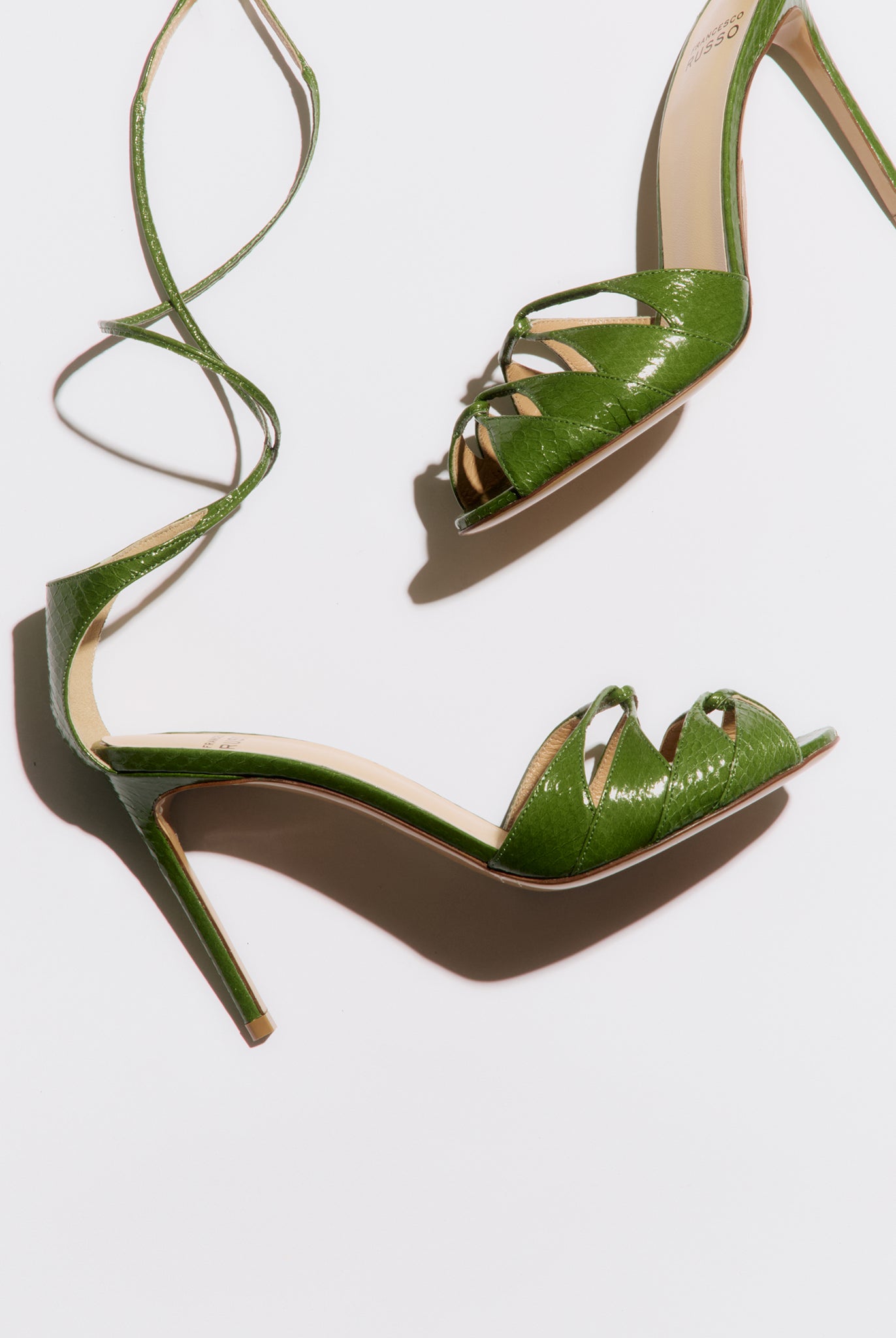 Green high-heeled laced sandal