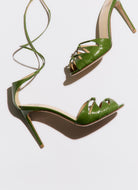 Green high-heeled laced sandal