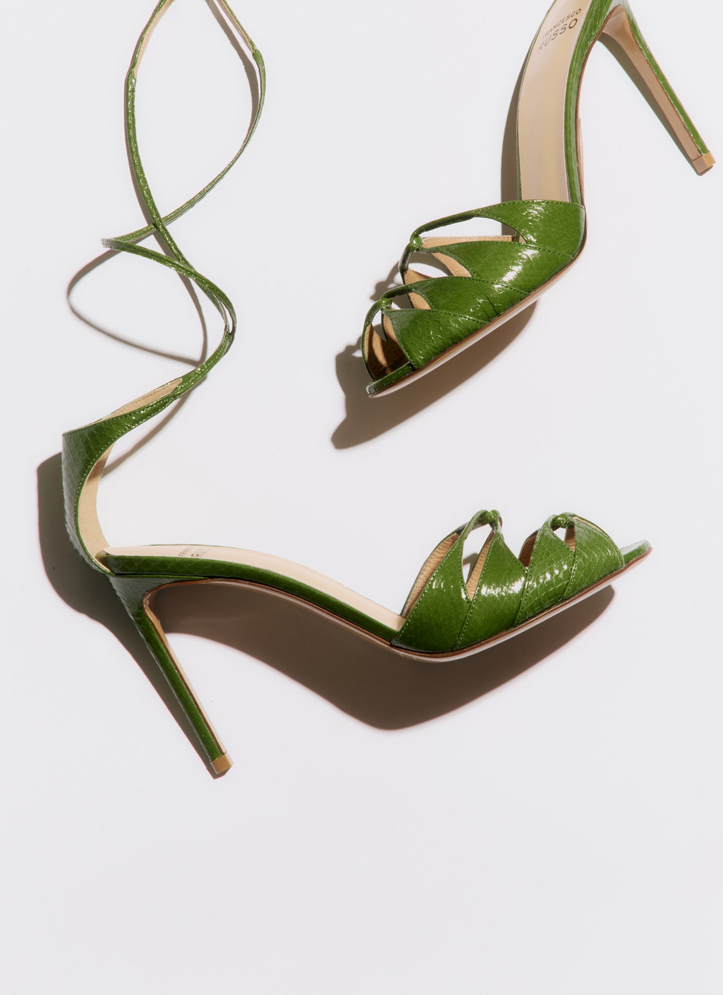 Green high-heeled laced sandal