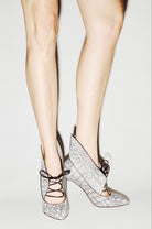 Laced up high pump archive