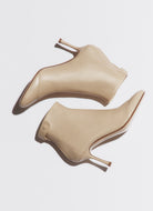 dust soft bootie with a zip and button closure on the back heel hight 95mm