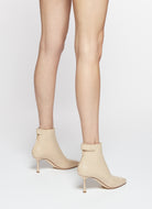 dust soft bootie with a zip and button closure on the back heel hight 95mm